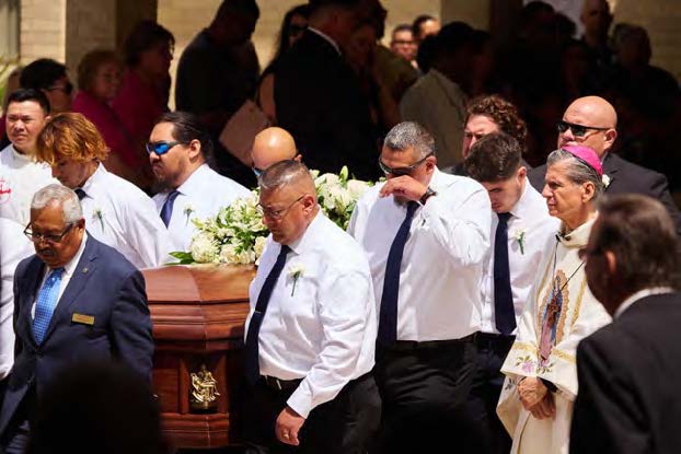 Fr. Thomas and Archbishop Gustavo García-Siller of San Antonio at the funeral of Irma Garcia.
