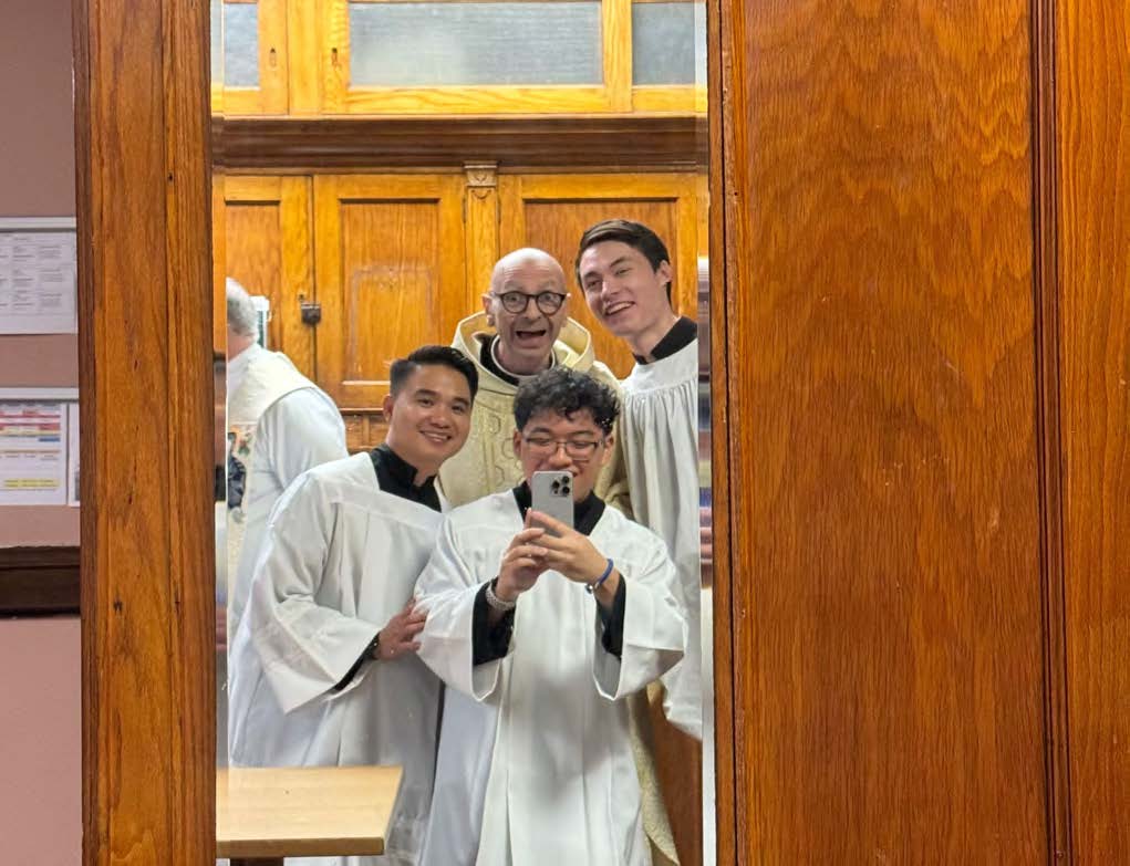 Son Lai, Fr. Richard Bennett, Andrew Tran-Chung, and Sean Wu take a selfie in the sacristy before Fr. Richard’s Installation Mass at Immaculate Conception Parish in the Bronx.