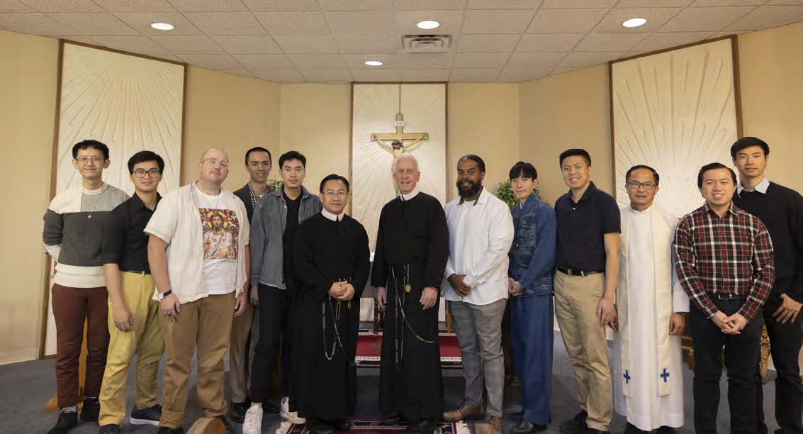 Vocations prospects with Redemptorist confreres and students.