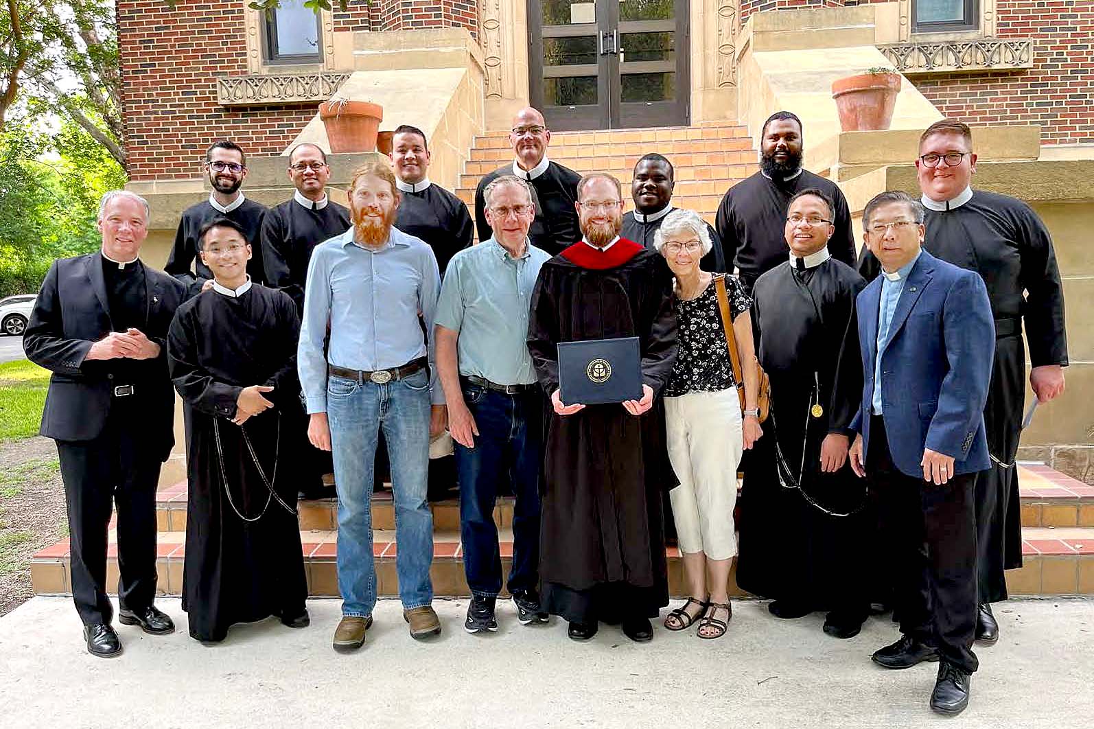 Deacon Steven Urban with family, friends and confreres at his graduation from Oblate School of Theology in 2024