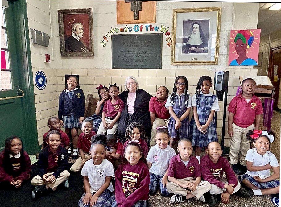 Sr. Monica Ellerbusch with the Kindergartners.